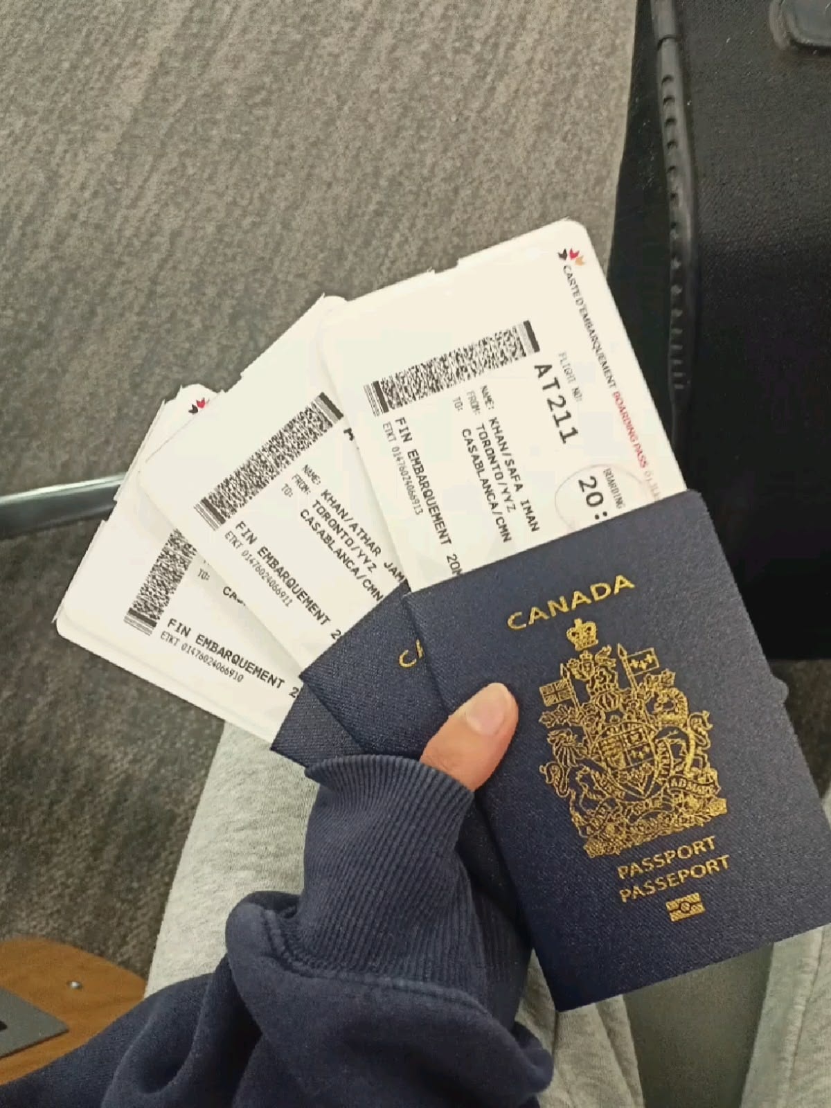 Canadian passport and travel documents photographed during a journey